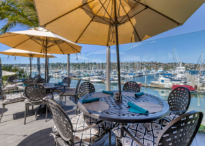 Outdoor Dining Tables in front of marina