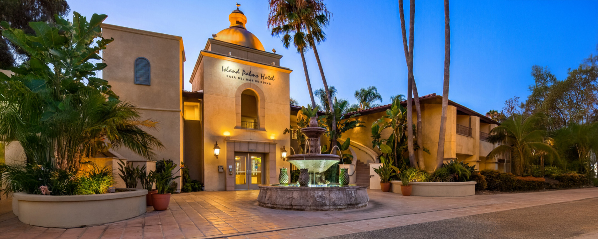 Island Palms exterior at night