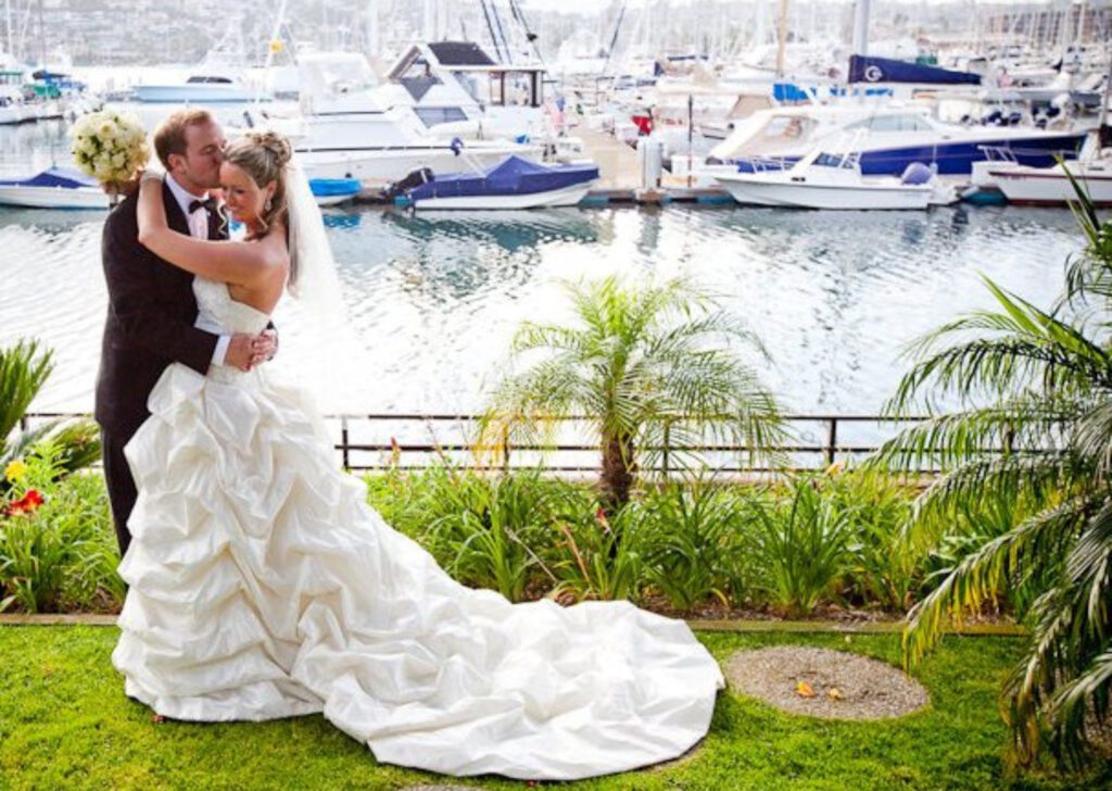 bride and groom by the water