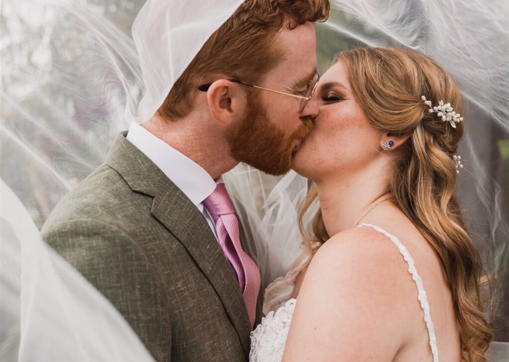 bride and groom kissing