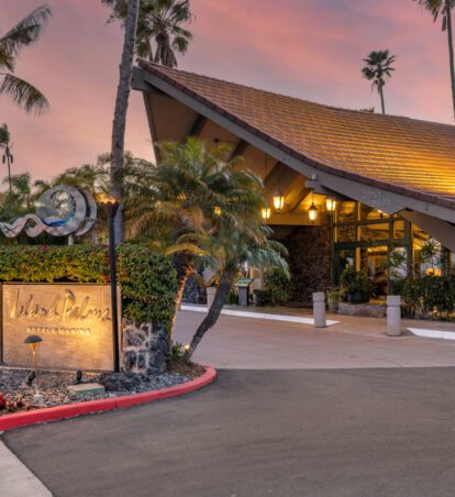 Island Palms entry at sunset