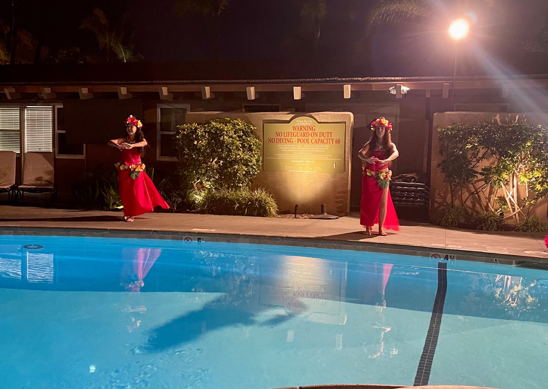 Island dancers by the pool