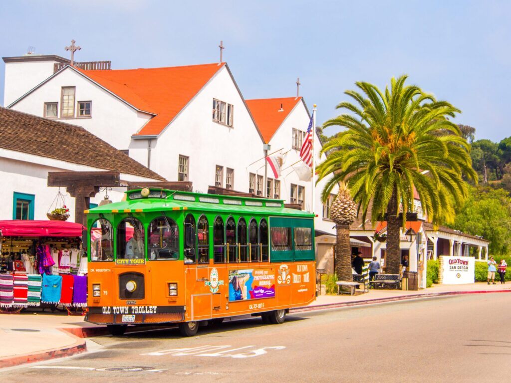 a green and orange trolley