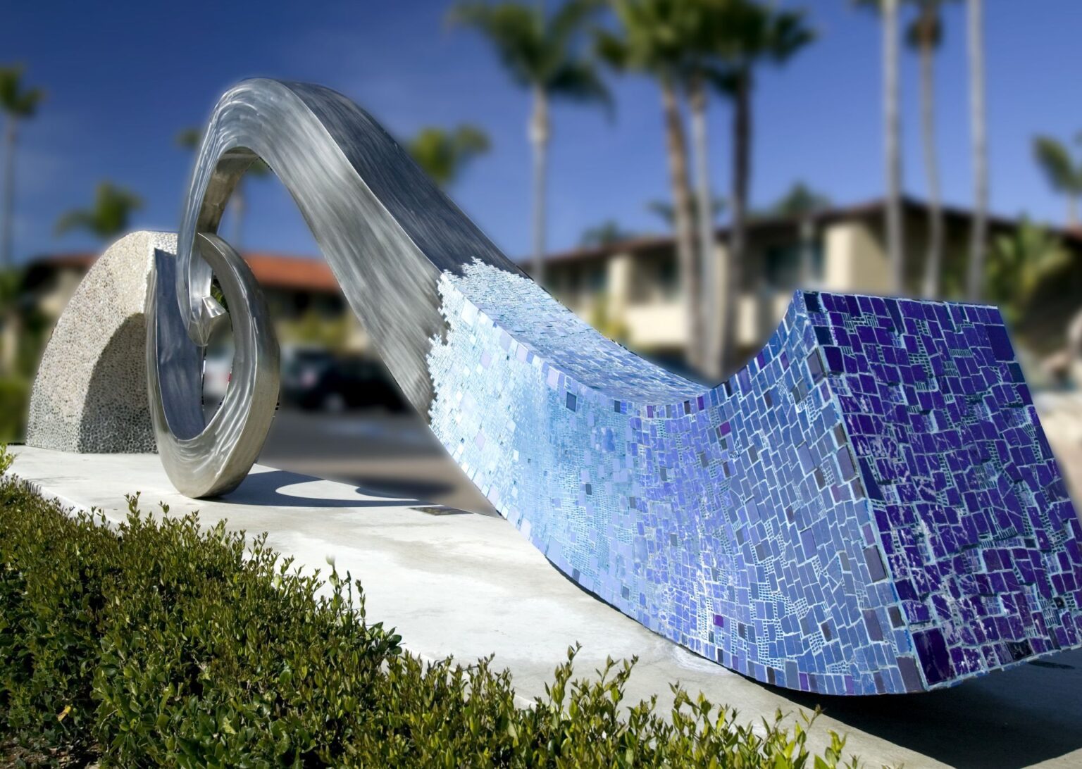 a metal sculpture with mosaic details