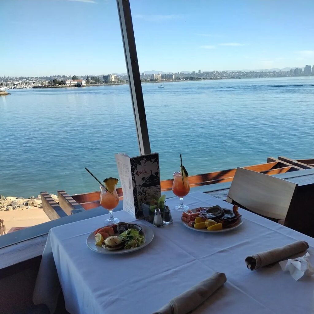 a dining table overlooking the water