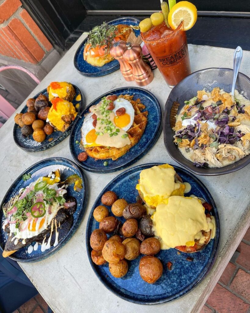 a table full of brunch dishes