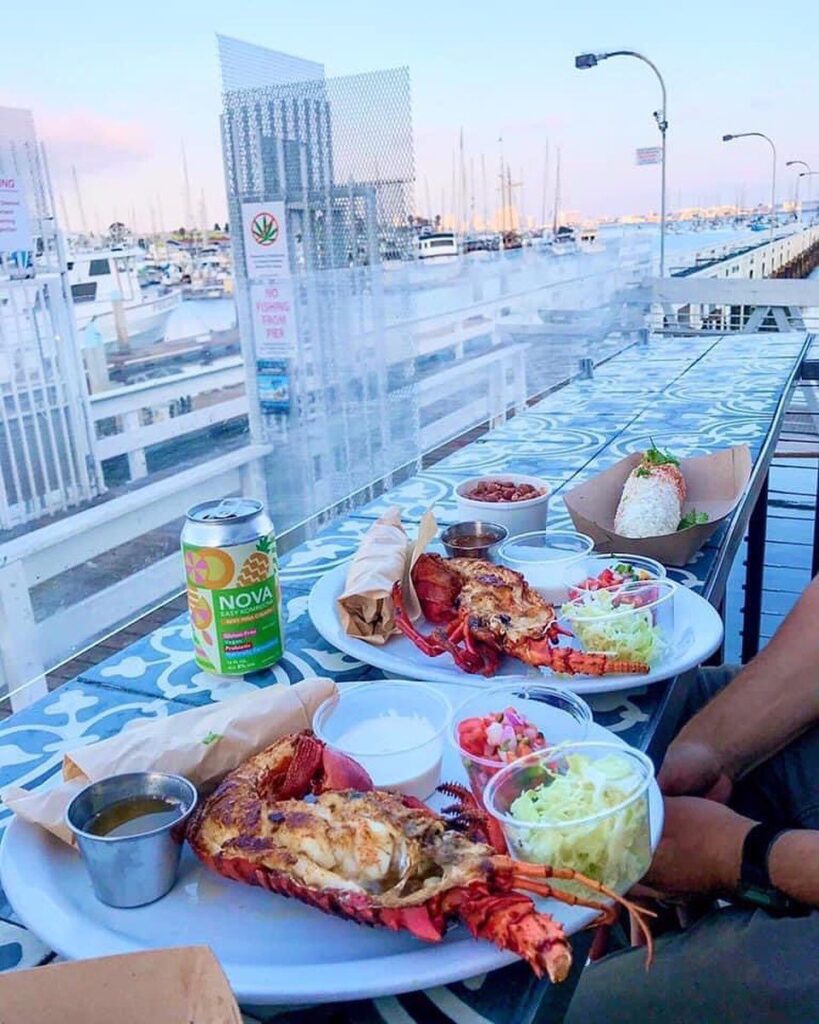 outdoor dining by a marina