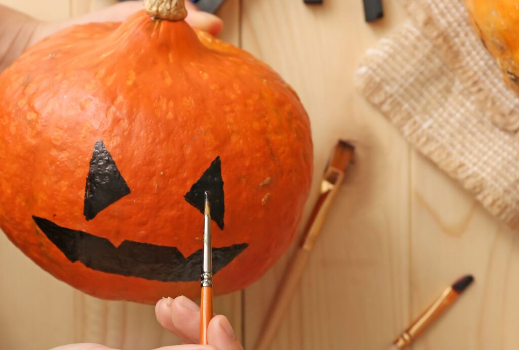 pumpkin being painted