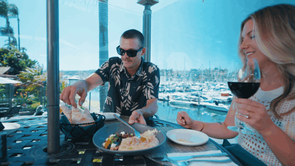 Guests enjoying outdoor dining patio at Blue Wave Bar and Grill
