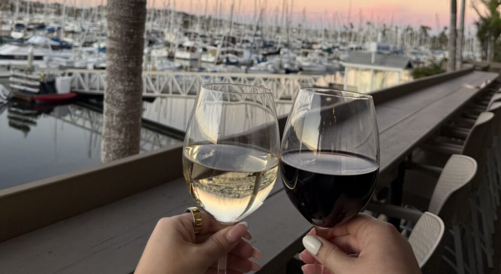 a glass of red and white wine